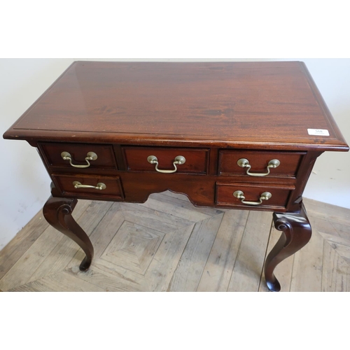 568 - Quality reproduction mahogany low boy with central drawer flanked by four further short drawers (73c... 