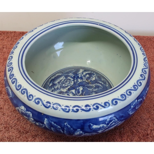 573 - Large Oriental blue and white bowl with signature panel to the base (diameter 26cm, height 12cm)