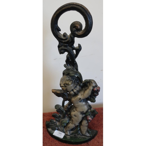 580 - Heavy cast metal doorstop in the form of a cherub (height 42cm)