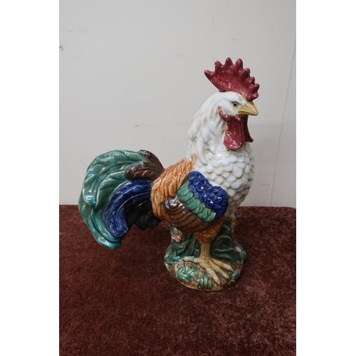 64 - Large studio pottery figure of a cockerel, base with various marks, including VIAVL? (height 42cm)