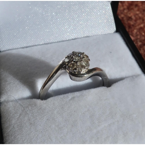 56 - 9ct white gold diamond flower head ring (size M 1/2)