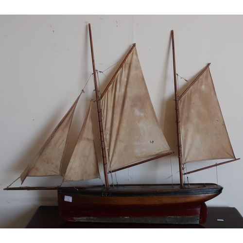 15 - Early to mid 20th C scale model pond yacht of a twin masted fishing yawl with LT6 (Lowestoft) regist... 
