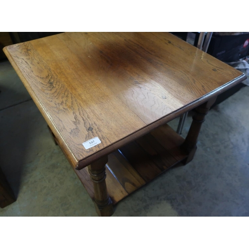 597 - Quality oak two tier occasional table on turned supports (60cm x 60cm x 50cm)