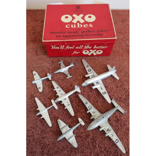 599 - Vintage Oxo tin, containing a selection of various Dinky aircraft, sea planes etc