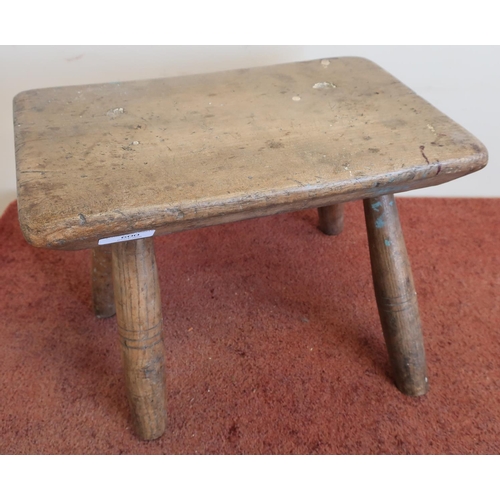 600 - 19th C elm rectangular topped milking type stool on four supports (1 leg loose)