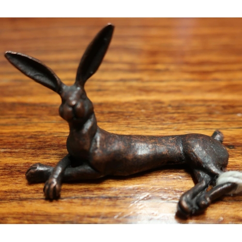 125 - Signed David Meredith bronze figure of a hare (length 4.5cm)