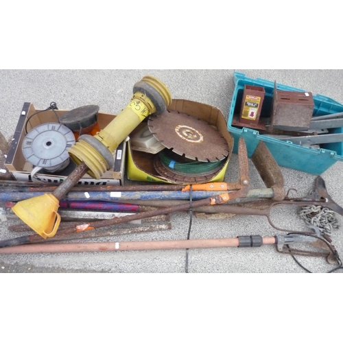 151 - Large collection of tools including sledgehammer, hay fork, tree pruner, hinges etc