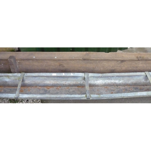 171 - Large galvanised feeding trough and a large wooden feeding trough