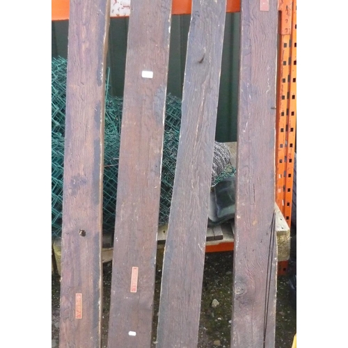 199 - Four large wooden posts