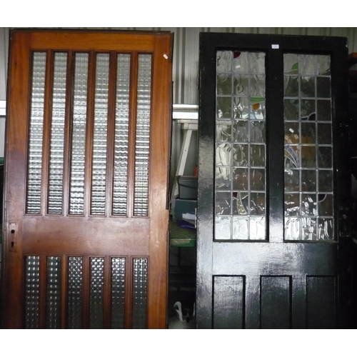 33 - Two large doors with glass panelling