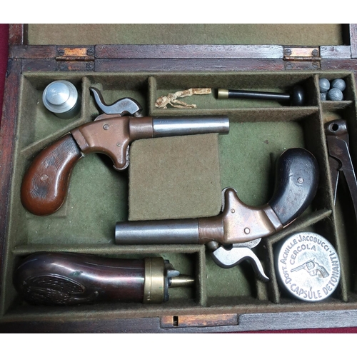 2 - Cased pair of percussion cap Derringer type pistols with 2 inch turn off barrels, brass actions and ... 
