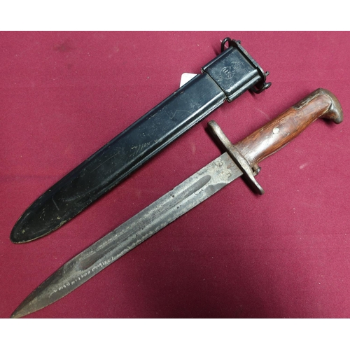 60 - American bayonet with 9 3/4 inch blade, two piece wooden grips, composite body sheath marked US