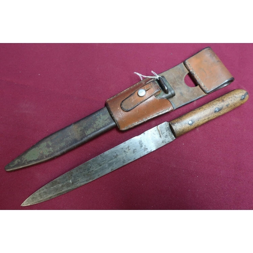 61 - c.WWI Austria Hungarian trench knife complete with sheath leather frog and two piece wooden grips