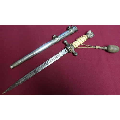93 - German Kriegsmarine officers dagger, with 9 1/2 inch double fullered blade (pitted), naval crosspiec... 