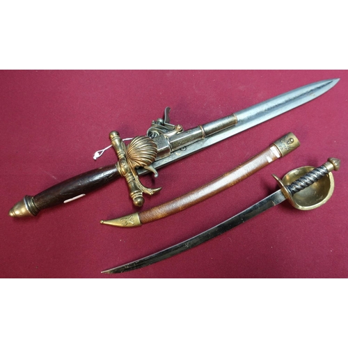 179 - Reproduction flintlock combination pistol hunting dagger and a miniature Spanish style sword (2)