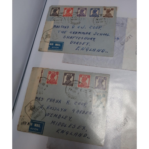 202 - Folder of various WWII period envelopes with various postage stamps, including Indian, various censo... 