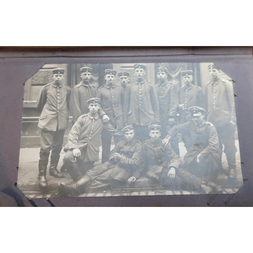 205 - WWI Kriegsmarine postcard album with large selection of various assorted black and white postcards i... 