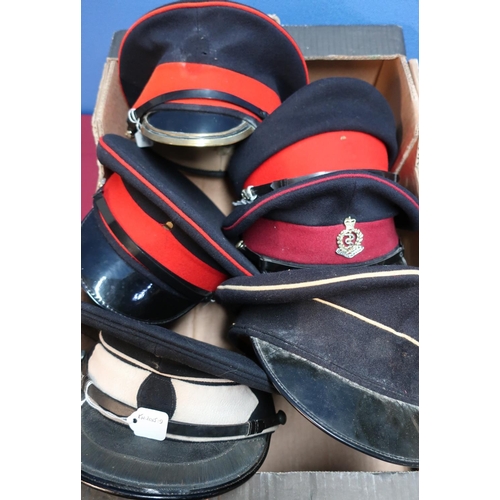 208 - Collection of six military peaked caps, including guards regiment, female caps, etc