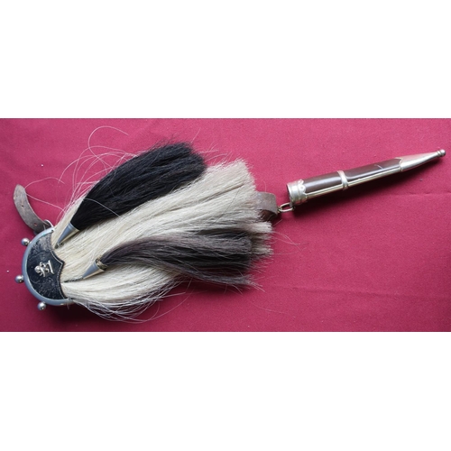 221 - Scottish crested horse hair sporran with white hair backing and two black tassels with white metal m... 