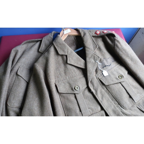 236 - 1953 49 pattern battle dress with captains shoulder pips, and another similar dated 1950 (2)