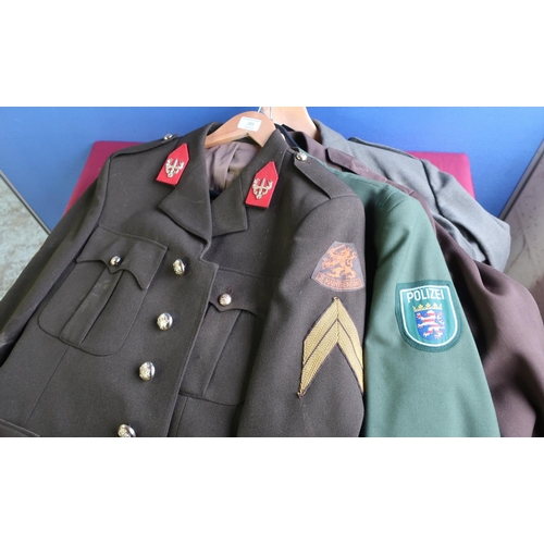 285 - Group of four continental military/police dress uniforms