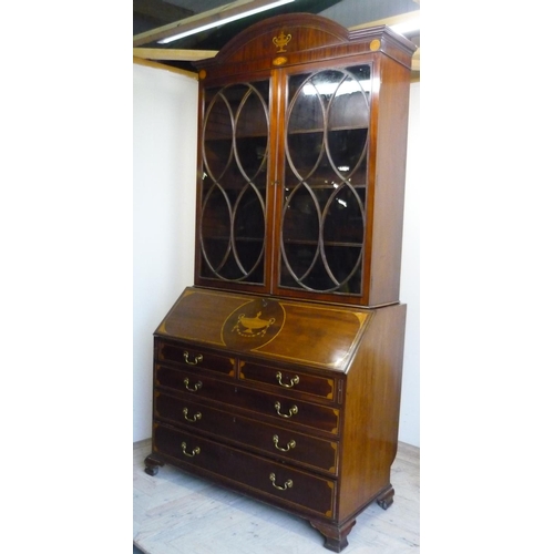 67 - 19th C mahogany bureau bookcase with arched top above two glazed cupboard doors with shelved interio... 