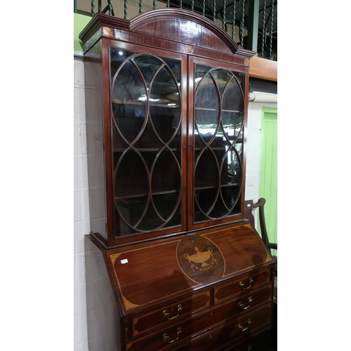 67 - 19th C mahogany bureau bookcase with arched top above two glazed cupboard doors with shelved interio... 