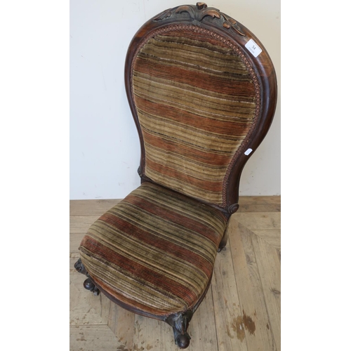 72 - Victorian mahogany framed nursing style chair with upholstered seat and back and carved detail