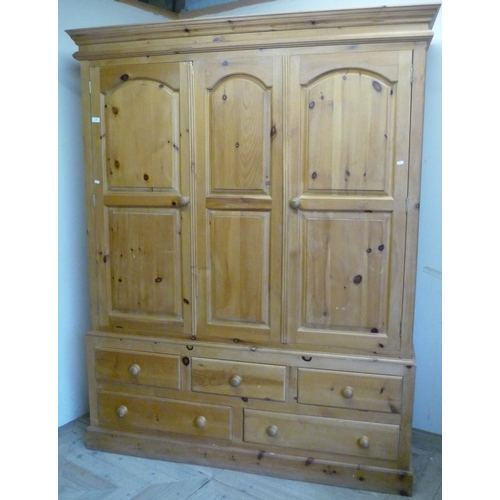 79 - Large modern triple door pine wardrobe with three short and two long drawers to the base (154cm x 52... 