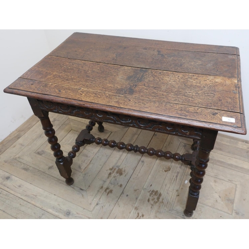 106 - 18th C oak planked top side table on bobbin turned supports and H shaped understretcher (91cm x 61cm... 