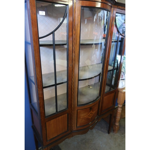 108 - Edwardian mahogany inlaid three tier display cabinet, with central bowfront glazed panel flanked by ... 