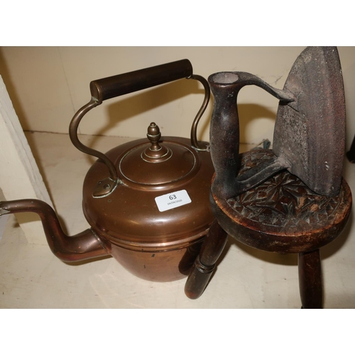 63 - Acorn finial copper kettle, small stool on turned supports and carved top, and a flat iron