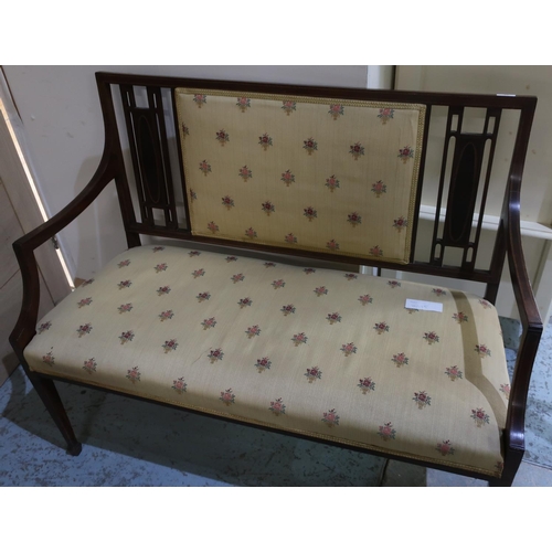 69 - Edwardian mahogany inlaid two seat settee with upholstered seat and back, on square tapering support... 