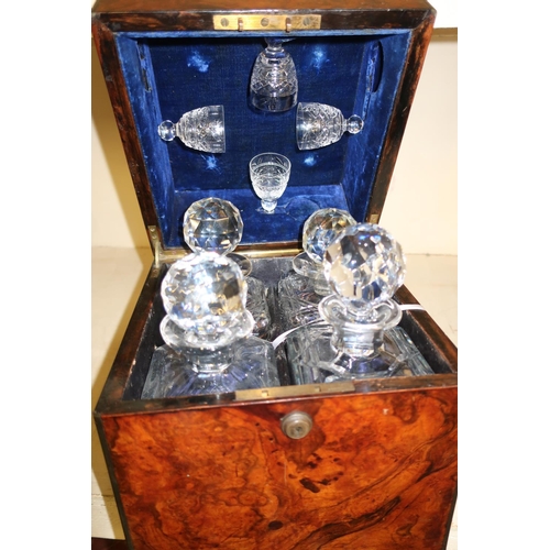 18 - 19th C burr walnut cased decanter box with inset brass carry handles, the hinged top revealing fitte... 