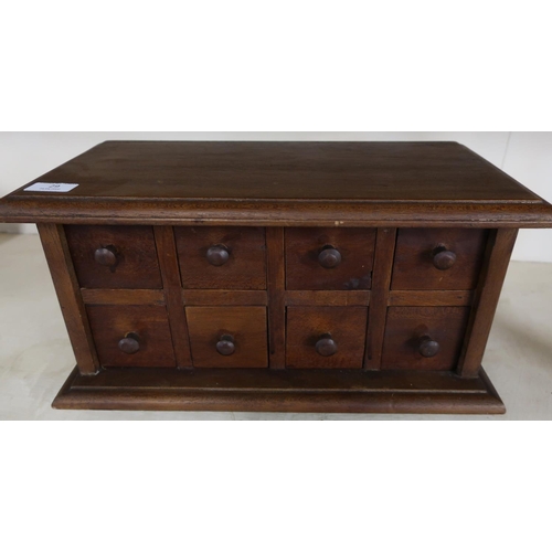 29 - Table cabinet in the form of eight pigeon hole drawers (44.5cm x 22cm x 24cm)
