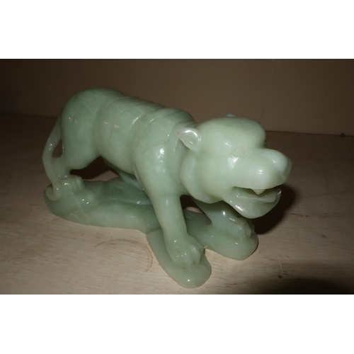 35 - Chinese carved hard stone figure of a tiger (length 21cm)