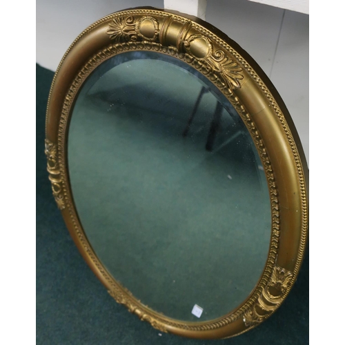 8 - Gilt framed bevelled edge oval wall mirror (83cm x 58cm)
