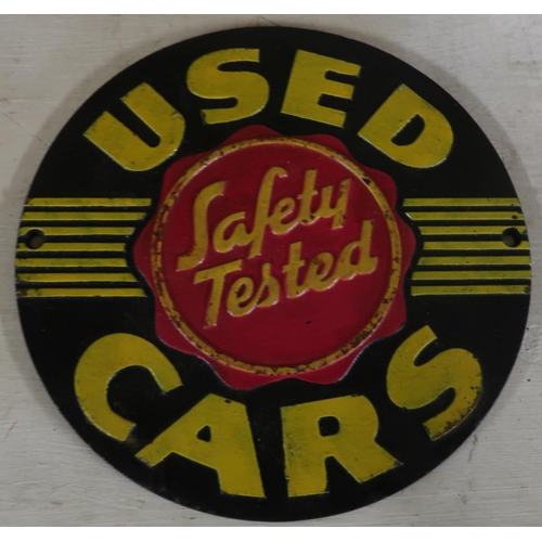 295 - Reproduction cast metal 'Safety Tested Used Cars' wall plaque