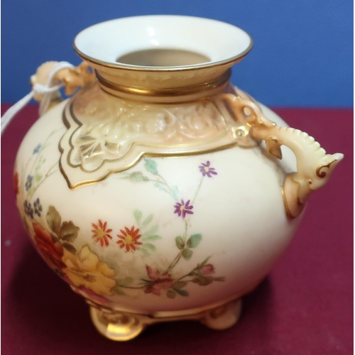 299 - Royal Worcester two handled ivory blush vase RDNO. 60366 no.1176 (chip to handle) (height 9cm)