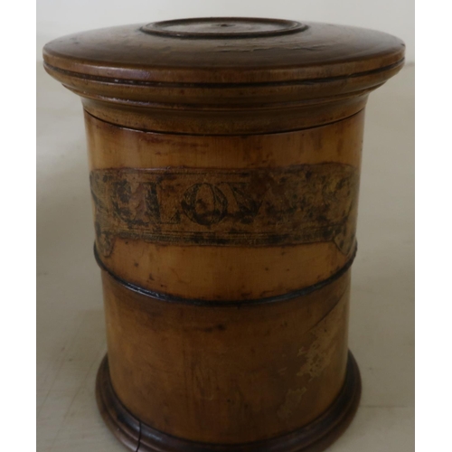 55 - 19th C two sectional turned wood spice tower with traces of Cloves label (height 10cm)