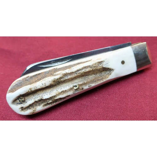 73 - Sheffield made 2 1/2 inch single bladed pocket knife with two piece Sambar horn grips