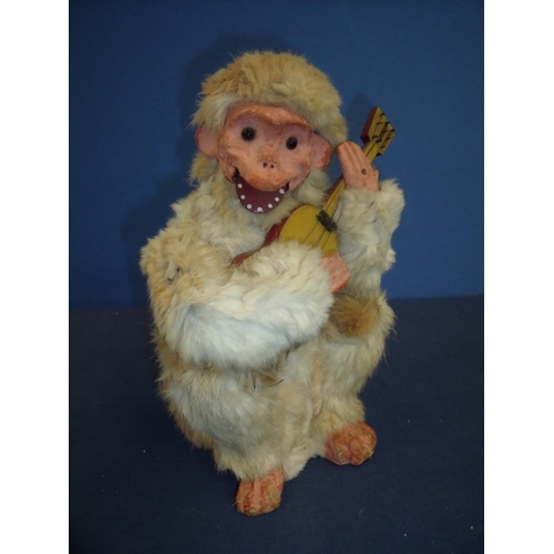 312 - French 19th/20th C Roullet and Decamps clockwork automaton, papier-mache and animal fur monkey (heig... 