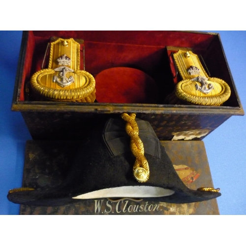 1 - Cased senior Naval officers bicorn hat and epaulettes in fitted and lined japped metal case with pla... 