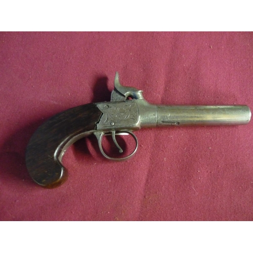 104 - Percussion cap pocket pistol with 3 1/4 inch turn off barrel, various proof marks and walnut grip