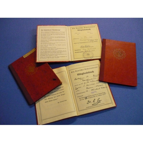 120 - Group of four German Third Reich Labour Corp pass books with various stamped markings, date mid 1930... 