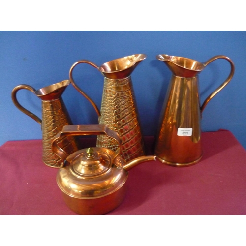 311 - Large copper jug marked J.S & SB No 4, two similar jugs with crocodile skin effect pattern and a cop... 