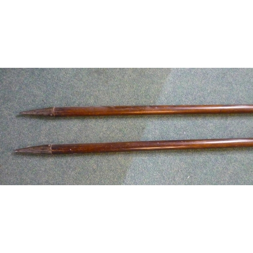 98 - Pair of Lochaber Axes on wooden shafts with butt spikes (overall length 182cm)