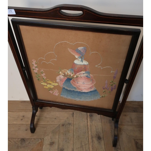 316 - Edwardian mahogany inlaid fire screen with tilting needlework embroidered panel (width 58cm)