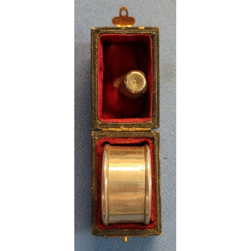 15 - Cased Birmingham silver hallmarked napkin ring and a Birmingham 1909 silver hallmarked thimble (2)