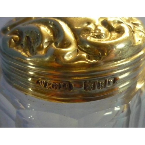 33 - Rectangular silver topped dressing table jar with crocodile skin leather insert top, London 1938 (ch... 